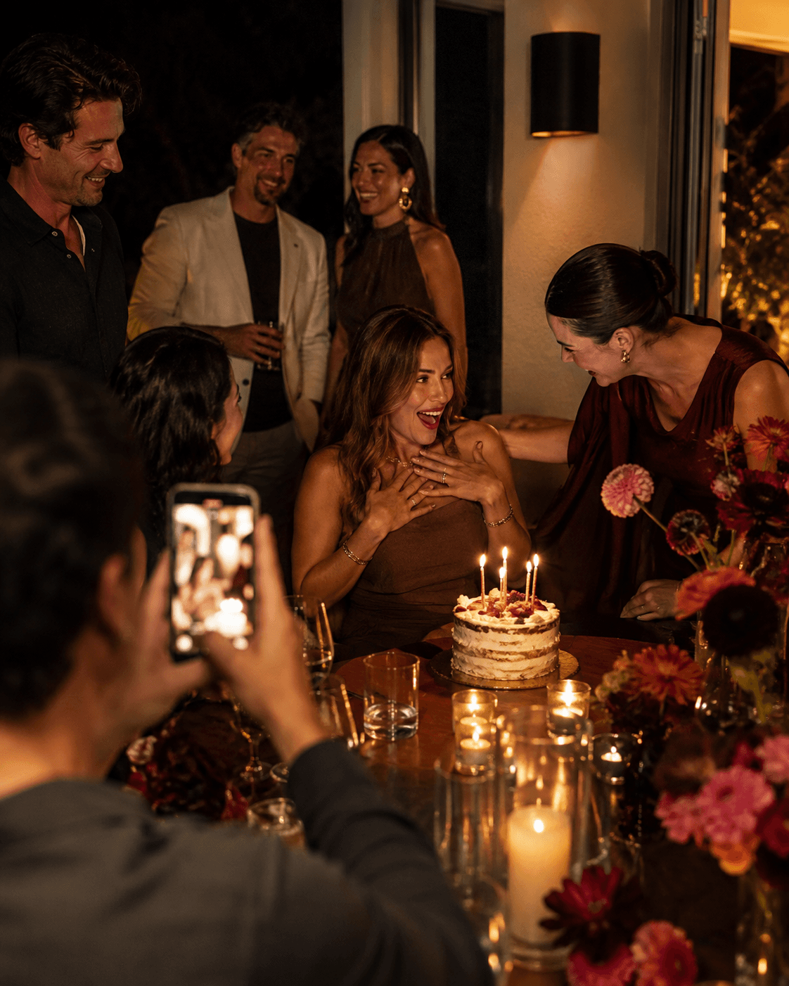 Conceptual scene — milestone birthday celebration, cake and candles